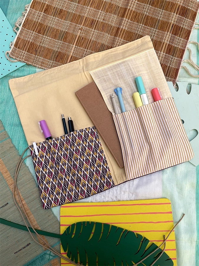 Pochette A5 faite à la main. Pour transporter un carnet, des stylos, fournitures scolaires et artistiques...