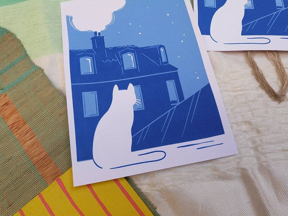 Paysage nocturne représentant une ville de nuit, avec un chat. Sérigraphie artisanale.